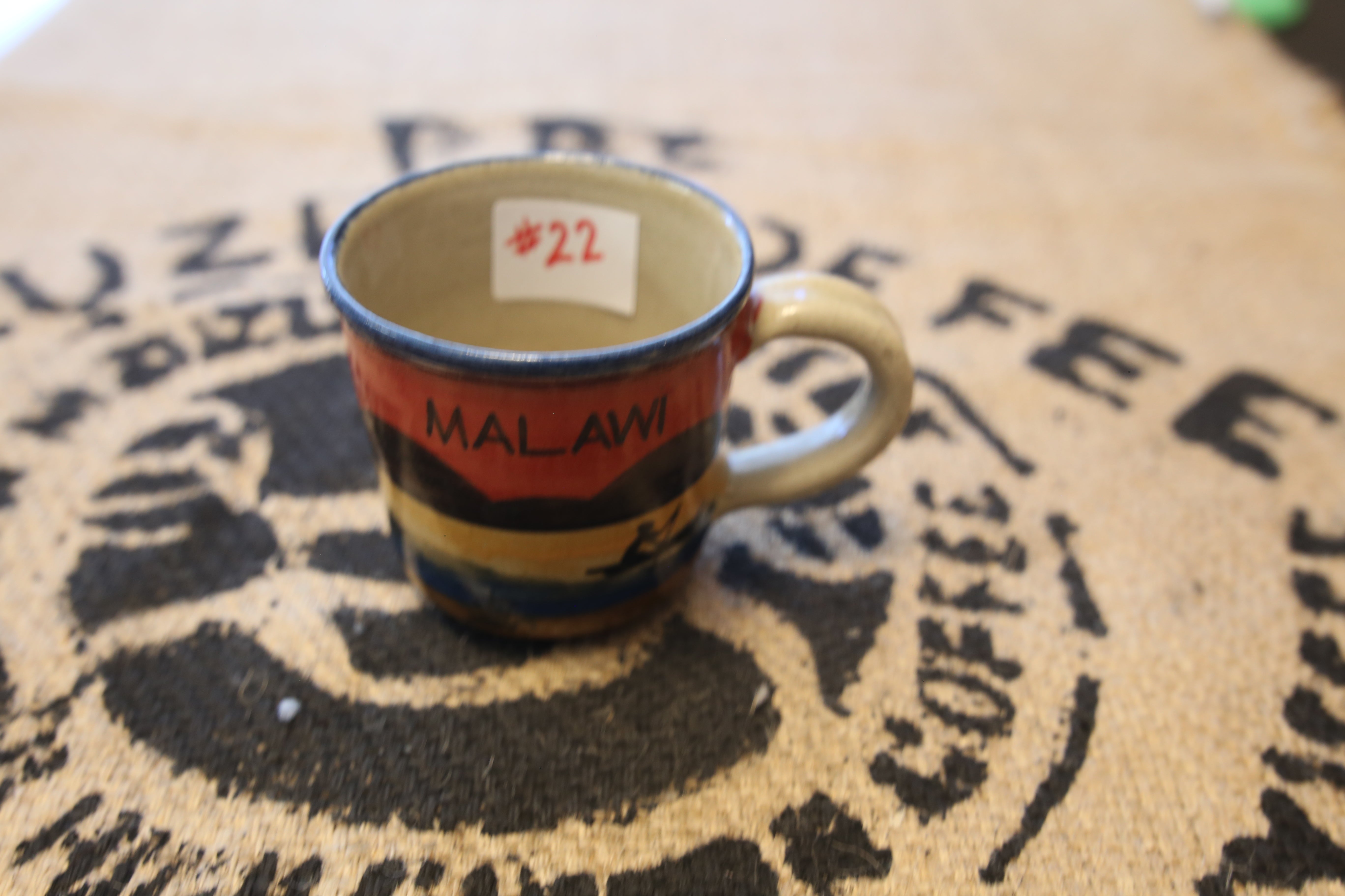 #22 Dedza  mug    "Malawi"  with colorful Lake Malawi scene with canoe